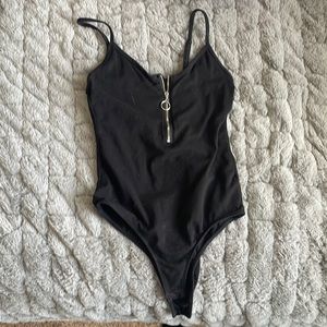 Black bodysuit in side “small” found in the juniors section.